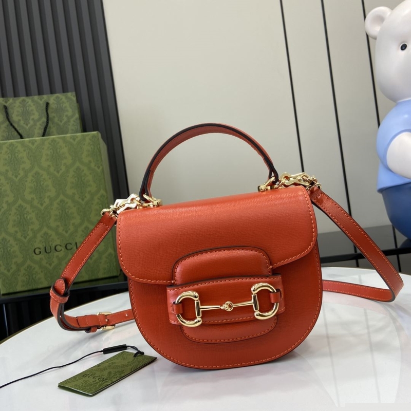 G*u*i top handle bags